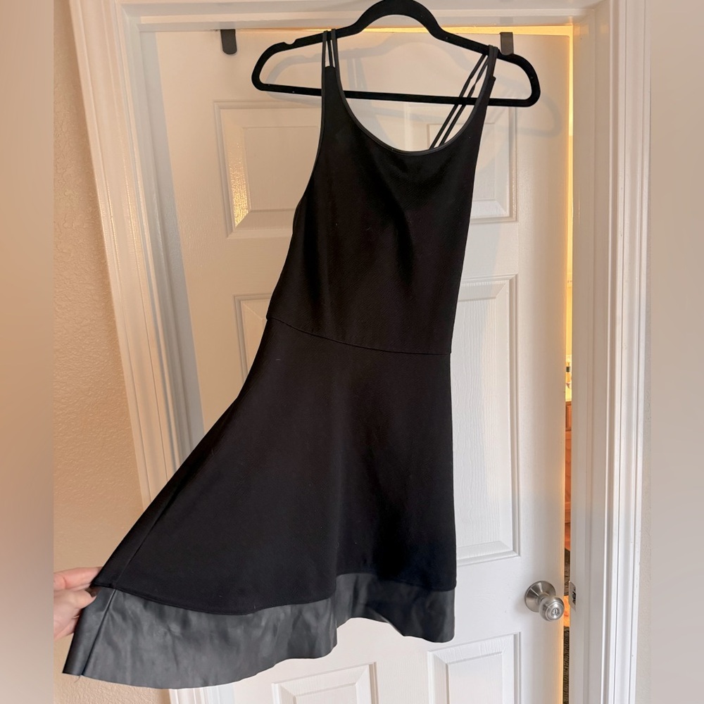Black dress with leather detail